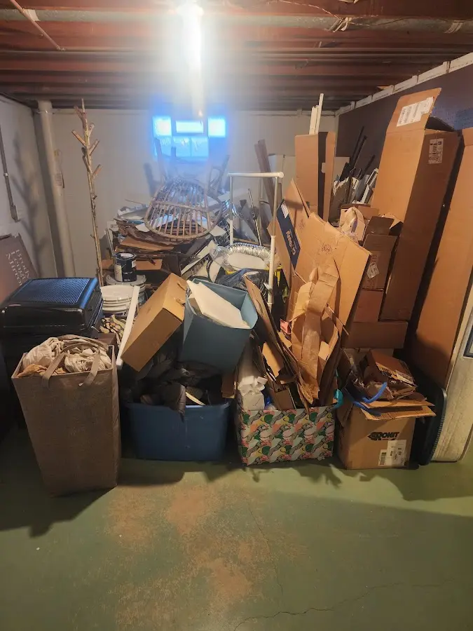 Roll-off dumpster container at job site for 2 Yard Dumpster Rental in Colville